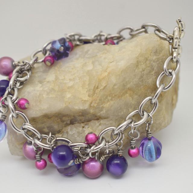 purple pink charm bracelet.jpg